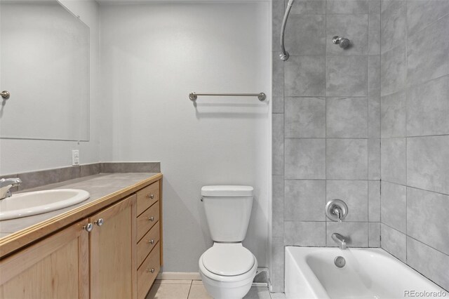 6711 S Race St, Centennial, CO 80122 - full bathroom featuring vanity, tile patterned flooring, toilet, and shower / washtub combination