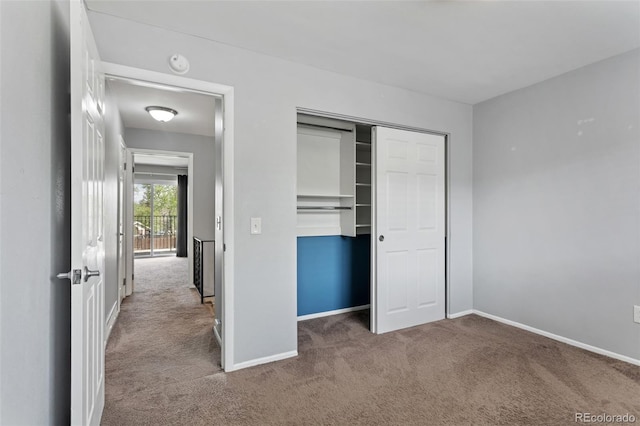 6711 S Race St, Centennial, CO 80122 - unfurnished bedroom with carpet floors, baseboards, and a closet