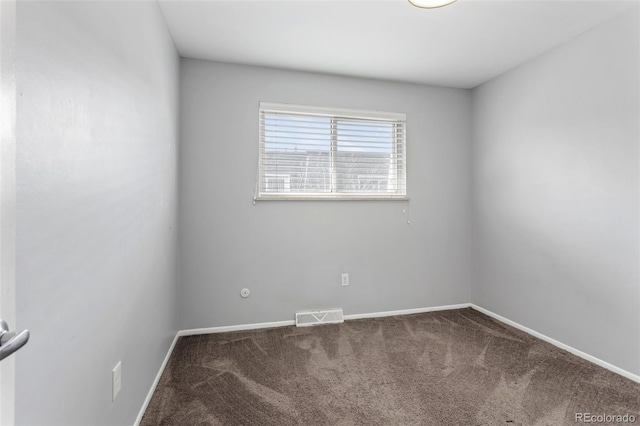 6711 S Race St, Centennial, CO 80122 - carpeted empty room with baseboards