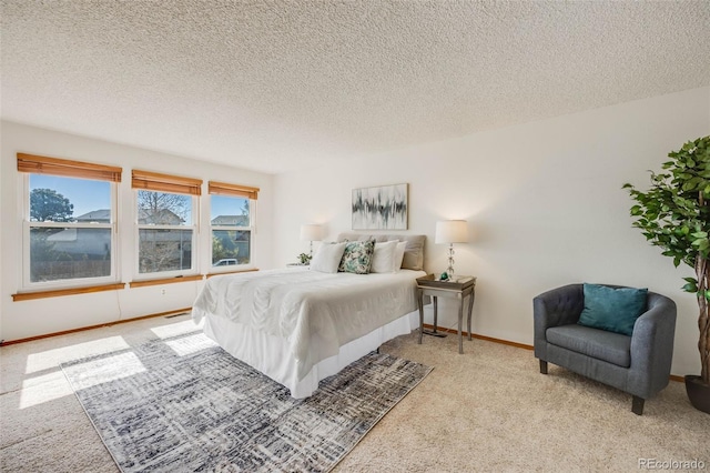 10436 W 84th Pl, Arvada, CO 80005 - bedroom featuring baseboards, carpet flooring, and a textured ceiling
