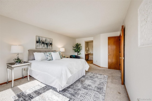 10436 W 84th Pl, Arvada, CO 80005 - bedroom featuring baseboards, ensuite bathroom, and carpet
