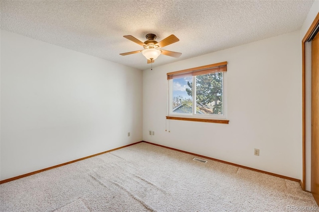 10436 W 84th Pl, Arvada, CO 80005 - empty room featuring carpet floors, a ceiling fan, a textured ceiling, and visible vents
