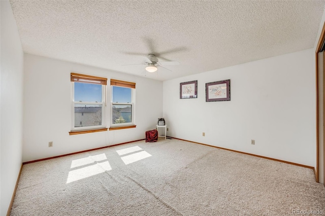10436 W 84th Pl, Arvada, CO 80005 - unfurnished room with baseboards, a ceiling fan, and carpet flooring