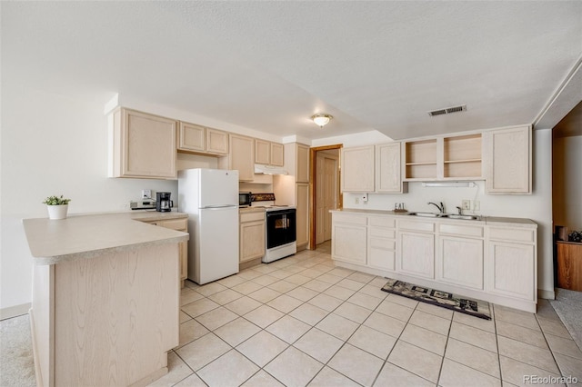 10436 W 84th Pl, Arvada, CO 80005 - kitchen with a peninsula, visible vents, light brown cabinetry, and white appliances