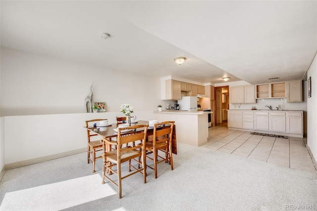 10436 W 84th Pl, Arvada, CO 80005 - dining space featuring baseboards, light colored carpet, and light tile patterned flooring