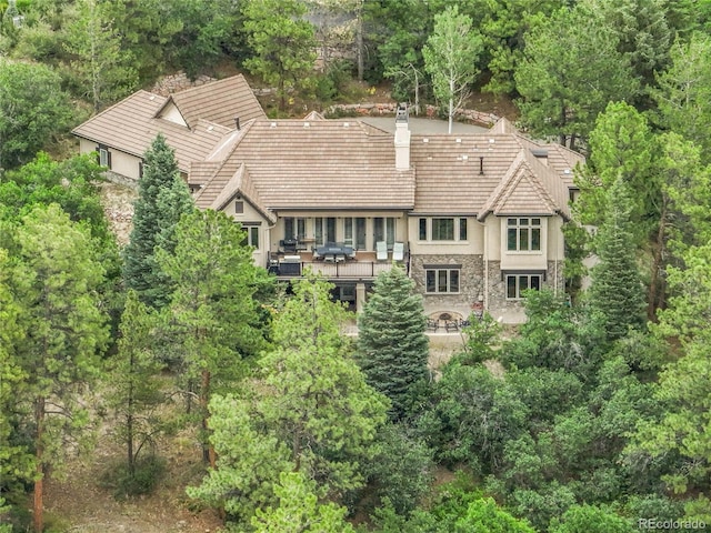917 Dakota Dr, Castle Rock, CO 80108 - view from above of property with a forest