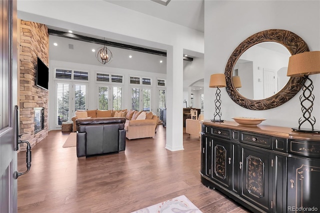 917 Dakota Dr, Castle Rock, CO 80108 - living room with wood finished floors, plenty of natural light, recessed lighting, a chandelier, and arched walkways