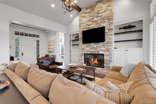 917 Dakota Dr, Castle Rock, CO 80108 - living room with built in features, a fireplace, healthy amount of natural light, and recessed lighting