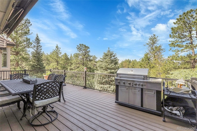 917 Dakota Dr, Castle Rock, CO 80108 - wooden deck with outdoor dining space