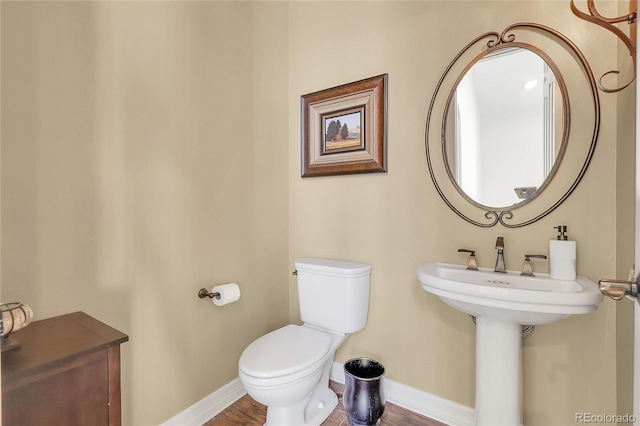 917 Dakota Dr, Castle Rock, CO 80108 - bathroom featuring baseboards and wood finished floors