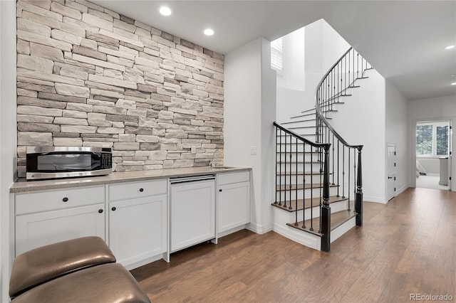 917 Dakota Dr, Castle Rock, CO 80108 - bar with stainless steel microwave, dark wood-style flooring, stairway, and recessed lighting