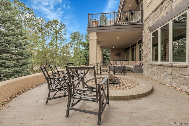 917 Dakota Dr, Castle Rock, CO 80108 - patio / terrace featuring a patio and an outdoor living space with a fire pit