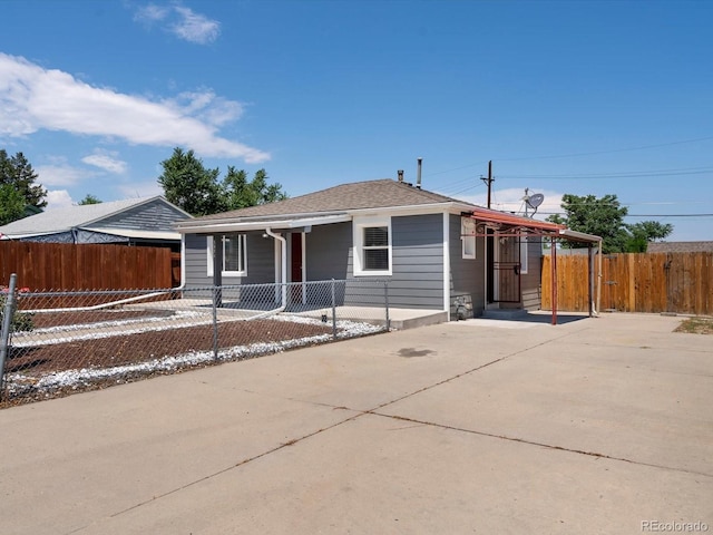 3971 W Kentucky Ave, Denver, CO 80219 - view of front facade featuring concrete driveway