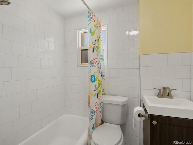 3971 W Kentucky Ave, Denver, CO 80219 - bathroom featuring tile walls, shower / bath combo with shower curtain, and vanity