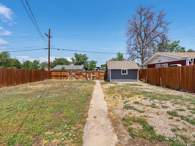 3971 W Kentucky Ave, Denver, CO 80219 - fenced backyard with an outbuilding