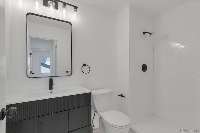 full bath with toilet, a shower, and vanity