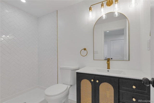 full bath featuring toilet, vanity, and a shower