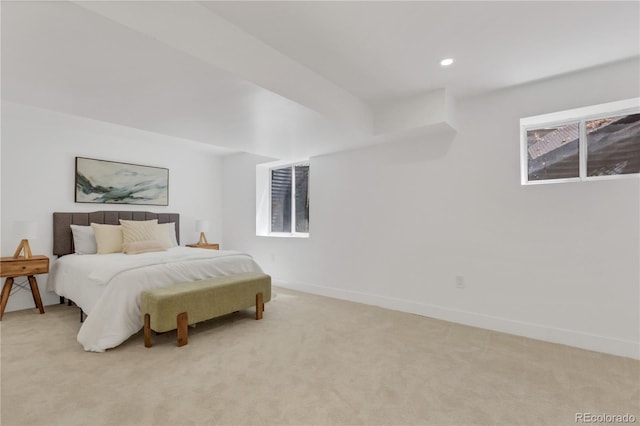 bedroom featuring light colored carpet, baseboards, and recessed lighting