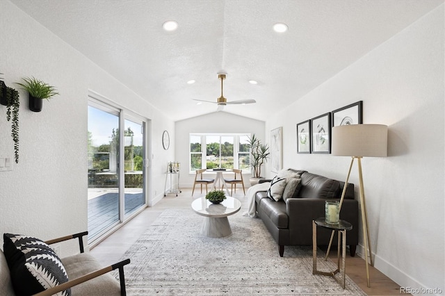 3206 S Pontiac St, Denver, CO 80224 - living area featuring vaulted ceiling, light wood-style flooring, a ceiling fan, and recessed lighting