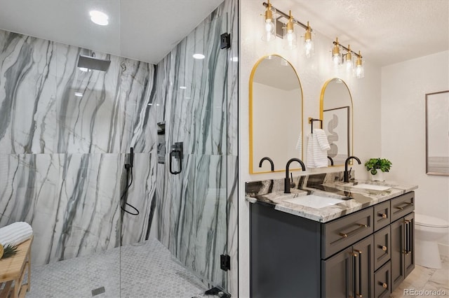 3206 S Pontiac St, Denver, CO 80224 - full bath with a marble finish shower, double vanity, and marble look tiles
