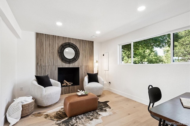 3206 S Pontiac St, Denver, CO 80224 - office space featuring healthy amount of natural light, recessed lighting, light wood-style floors, and a fireplace