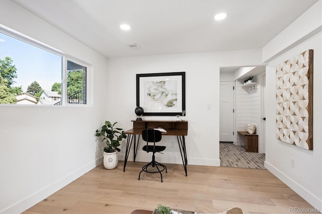 3206 S Pontiac St, Denver, CO 80224 - home office with light wood-style floors and recessed lighting