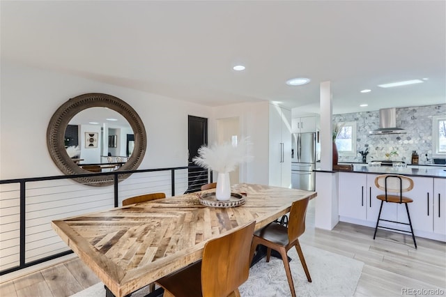 dining room featuring light hardwood / wood-style flooring