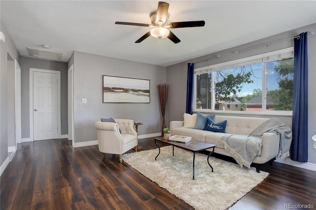 living room featuring ceiling fan and dark hardwood / wood-style floors