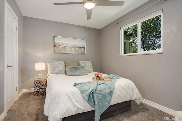 carpeted bedroom with ceiling fan