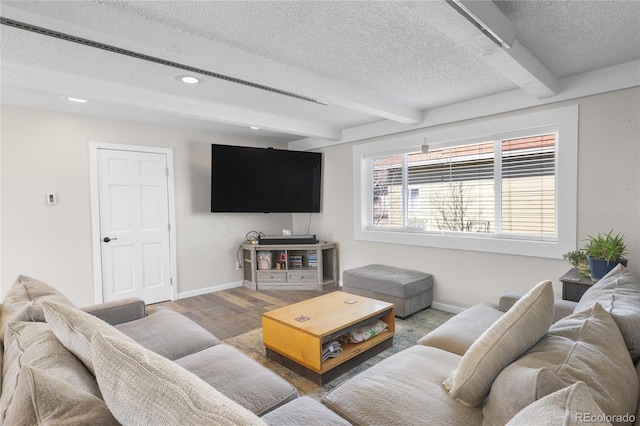 840 Mesa Dr, Silverthorne, CO 80498 - living room with a textured ceiling, beamed ceiling, baseboards, recessed lighting, and wood finished floors