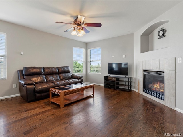 4816 S Elk Way, Aurora, CO 80016 - living room with wood finished floors, ceiling fan, and a fireplace
