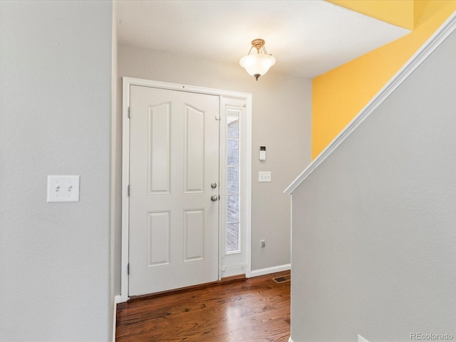4816 S Elk Way, Aurora, CO 80016 - entryway with wood finished floors and baseboards