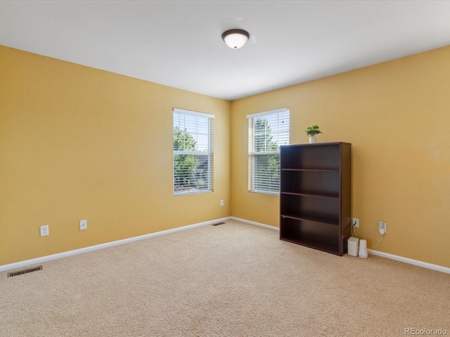 4816 S Elk Way, Aurora, CO 80016 - spare room featuring carpet flooring