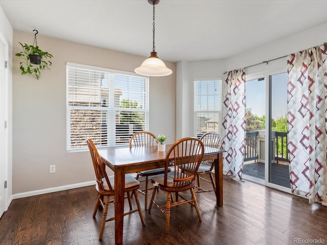 4816 S Elk Way, Aurora, CO 80016 - dining space featuring dark wood-style flooring and baseboards