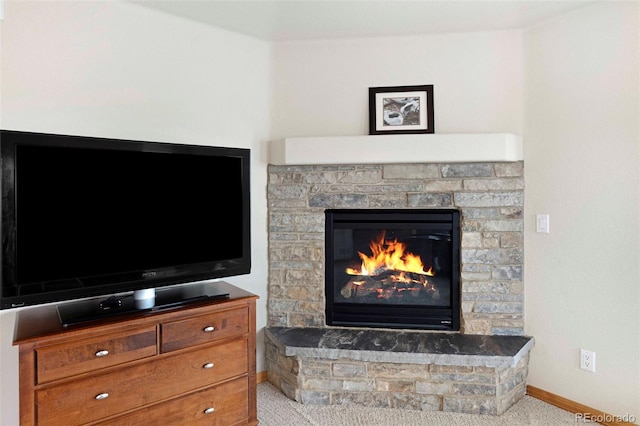 7724 Kryptonite Ln, Castle Rock, CO 80108 - detailed view of baseboards, carpet, and a stone fireplace