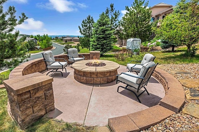 7724 Kryptonite Ln, Castle Rock, CO 80108 - view of patio / terrace with a fire pit