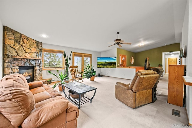 29825 Kennedy Gulch Rd, Conifer, CO 80433 - living room featuring carpet floors, ceiling fan, and a stone fireplace