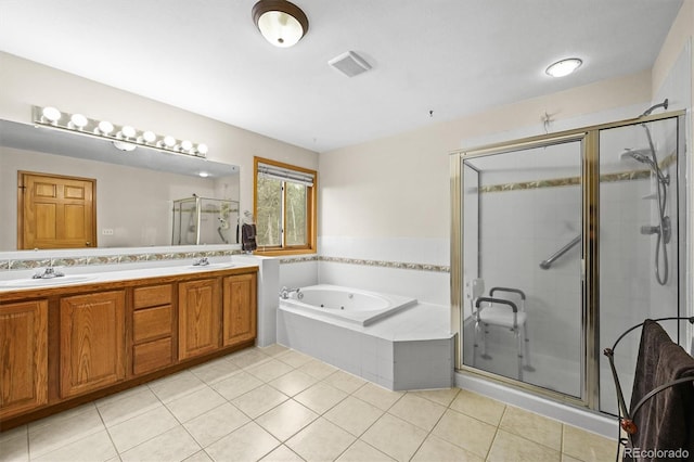 29825 Kennedy Gulch Rd, Conifer, CO 80433 - bathroom featuring a jetted tub, a shower stall, double vanity, and tile patterned floors