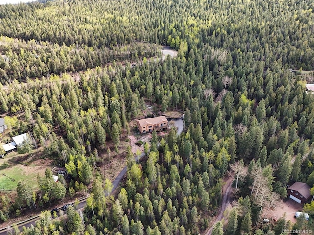29825 Kennedy Gulch Rd, Conifer, CO 80433 - aerial view of property and surrounding area with a heavily wooded area