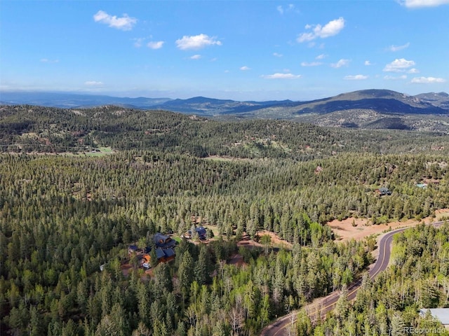 29825 Kennedy Gulch Rd, Conifer, CO 80433 - aerial view of property's location featuring a heavily wooded area and mountains