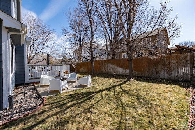 view of yard with a patio and a fenced backyard