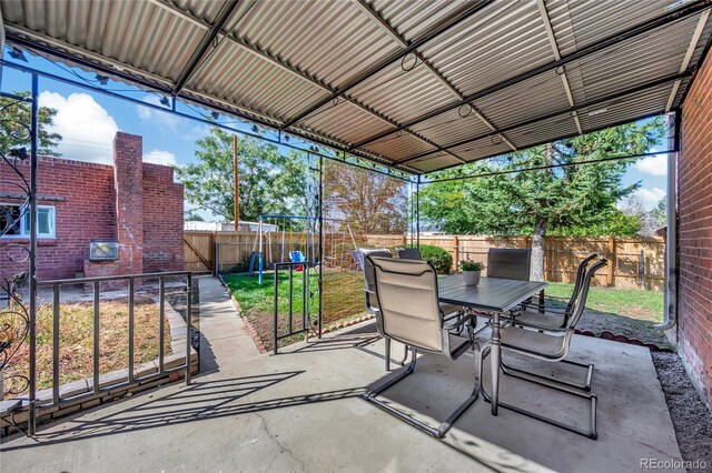 view of patio with a playground