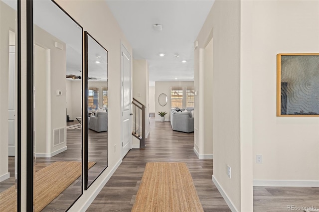 1061 S De Gaulle Ct, Aurora, CO 80018 - corridor with wood finished floors and recessed lighting