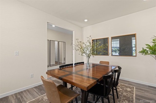 1061 S De Gaulle Ct, Aurora, CO 80018 - dining space with wood finished floors and recessed lighting