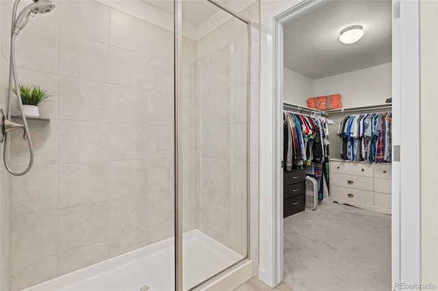 1061 S De Gaulle Ct, Aurora, CO 80018 - full bath with a stall shower and a walk in closet
