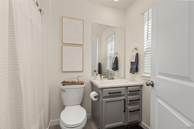 1061 S De Gaulle Ct, Aurora, CO 80018 - bathroom with vanity and a shower with curtain