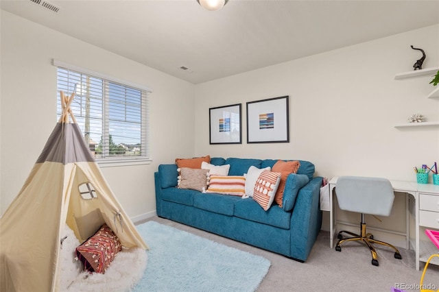 1061 S De Gaulle Ct, Aurora, CO 80018 - living room with carpet floors and an office area
