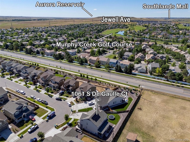1061 S De Gaulle Ct, Aurora, CO 80018 - aerial perspective of suburban area with a large body of water