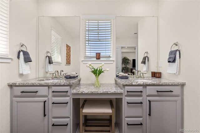 1061 S De Gaulle Ct, Aurora, CO 80018 - bathroom featuring two vanities