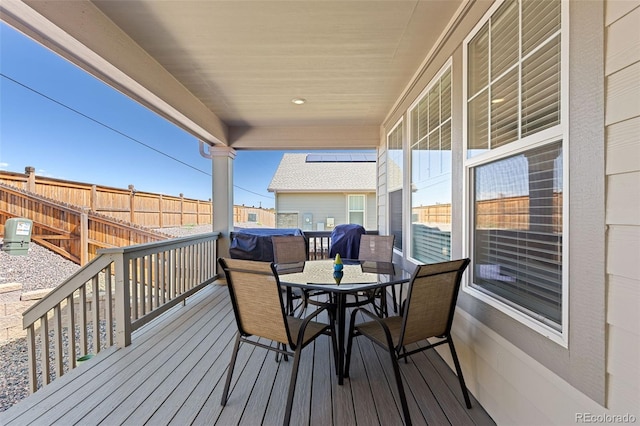 1061 S De Gaulle Ct, Aurora, CO 80018 - deck featuring outdoor dining area